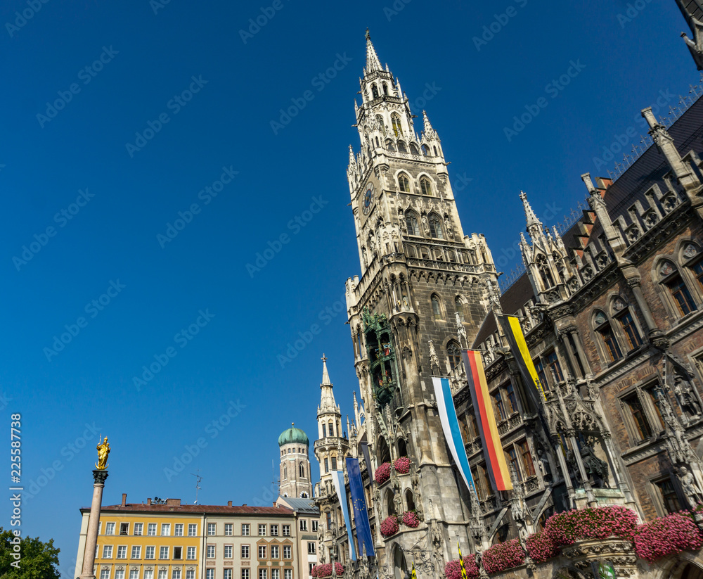 The clock tower of the new City Hall (Rathaus) in Marienplatz is a famous building in Gothic architecture - Munich, Bavaria, Germany, Europe