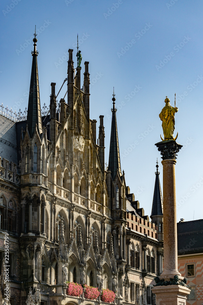 The clock tower of the new City Hall (Rathaus) in Marienplatz is a famous building in Gothic architecture - Munich, Bavaria, Germany, Europe