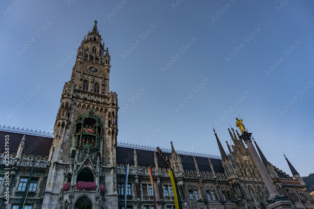 The clock tower of the new City Hall (Rathaus) in Marienplatz is a famous building in Gothic architecture - Munich, Bavaria, Germany, Europe