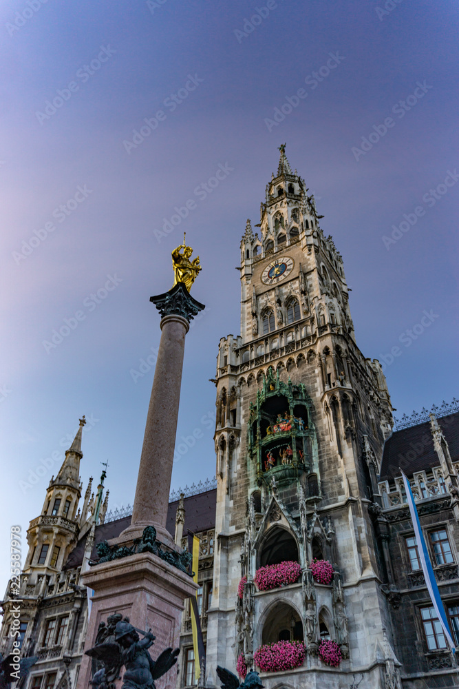 The clock tower of the new City Hall (Rathaus) in Marienplatz is a famous building in Gothic architecture - Munich, Bavaria, Germany, Europe