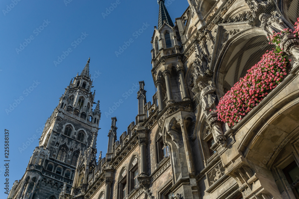 The clock tower of the new City Hall (Rathaus) in Marienplatz is a famous building in Gothic architecture - Munich, Bavaria, Germany, Europe