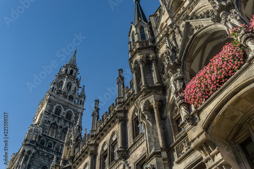 The clock tower of the new City Hall (Rathaus) in Marienplatz is a famous building in Gothic architecture - Munich, Bavaria, Germany, Europe