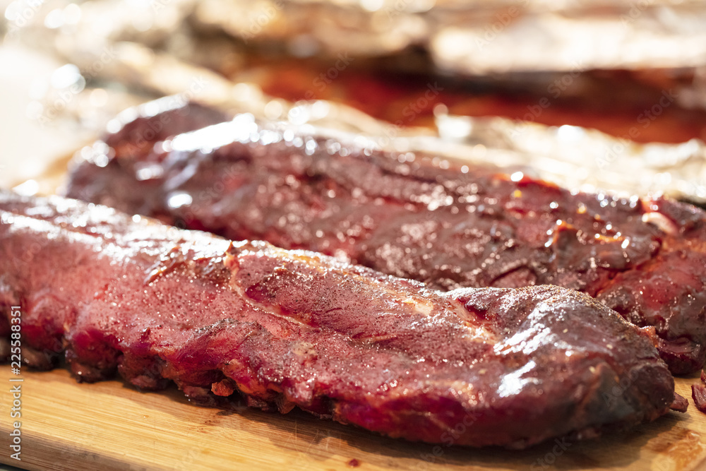 Barbecue Short Ribs with Sauce on a Cutting Board