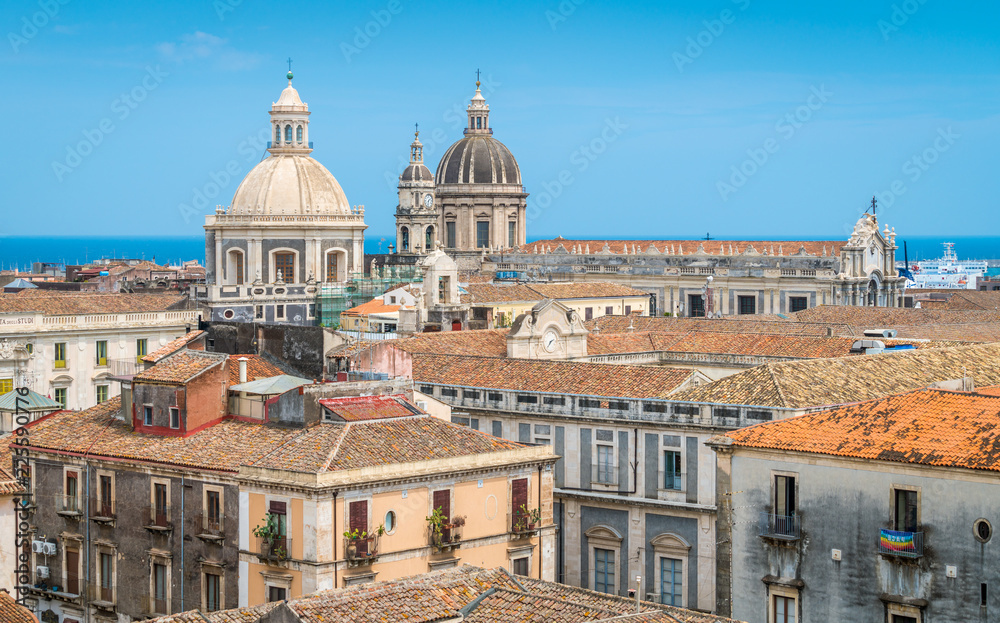 Rooftop view in Catania, with the domes of the Church of the Badia di Sant'Agata and the Sant'Agata Cathedral. Sicily, Italy.