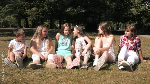 Children Whisper In Ear Of A Secret - A Picnic In The Park - Broken Phone Game