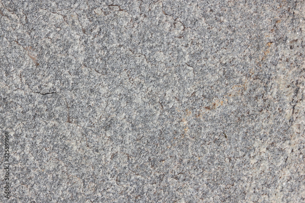 Granite background. Texture of gray granite stone. Natural pattern in gray tones. Abstract background Granite background. Texture of gray granite stone. Natural pattern in gray tones. Abstract background