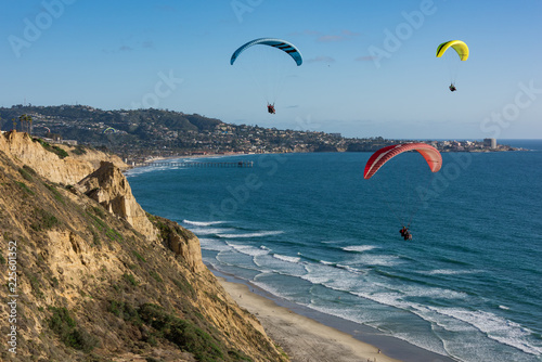 paragliding over the beach photo