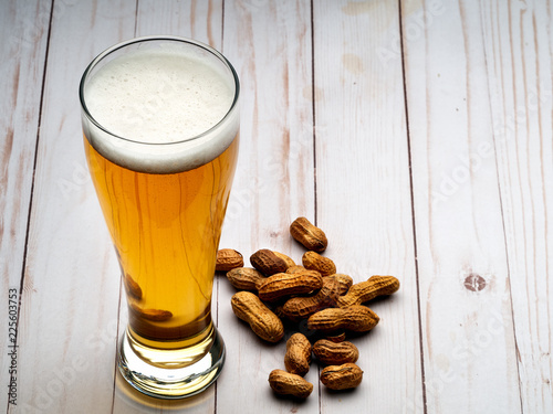 Pilsner beer and peanuts