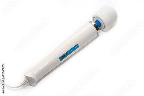 Massage for the body. Clitoral vibrator, intimate accessory on a white background. Side view