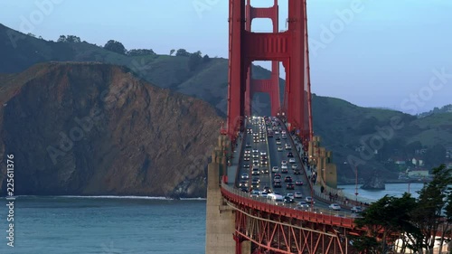 Illuminated traffic on Golden Gate Bridge in San Francisco photo