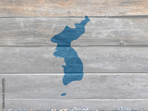 Flag of Korean Unification on wooden wall background. Grunge and texture,  Korean Peninsula in blue on white.