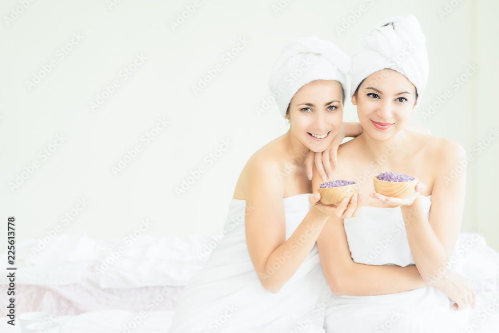 Skin Care Advertising Model.Beautiful Spa Woman with perfect skin showing empty copy space Skin Care Advertising Model.Beautiful Spa Woman with perfect skin showing empty copy space