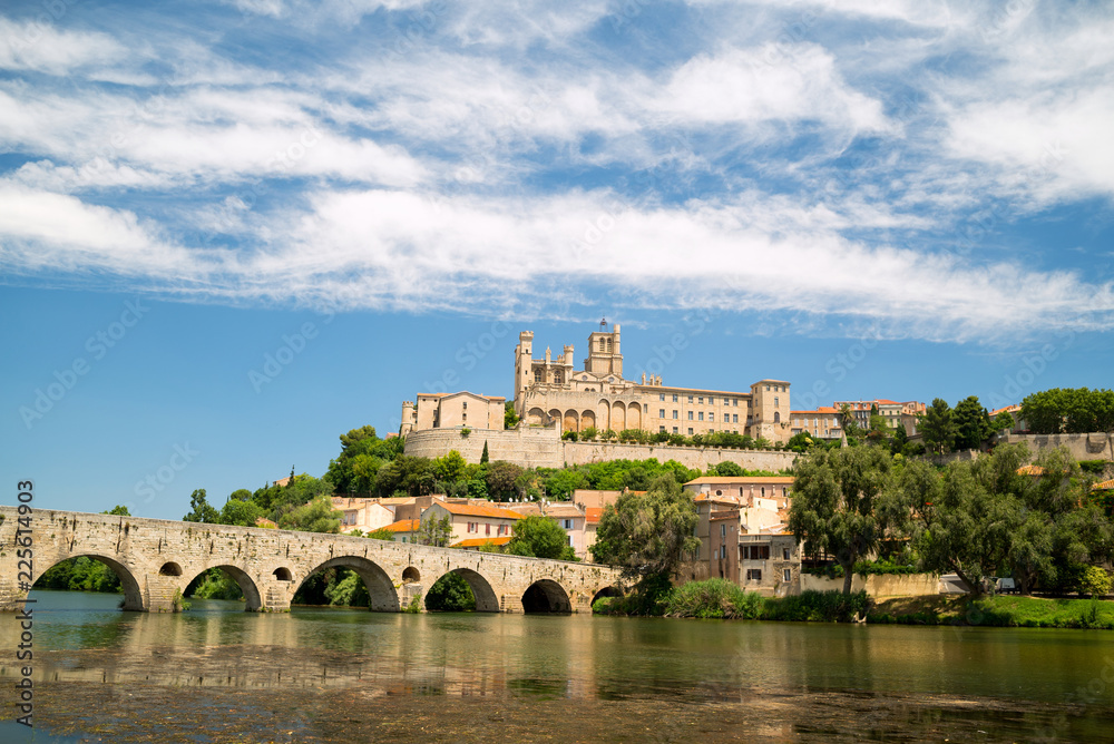 Old bridge and Saint Nazaire cathedral on the Orb river in Beziers, France