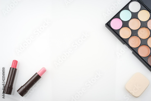 Creative arrangement of cosmetics. Top view or flat lay.