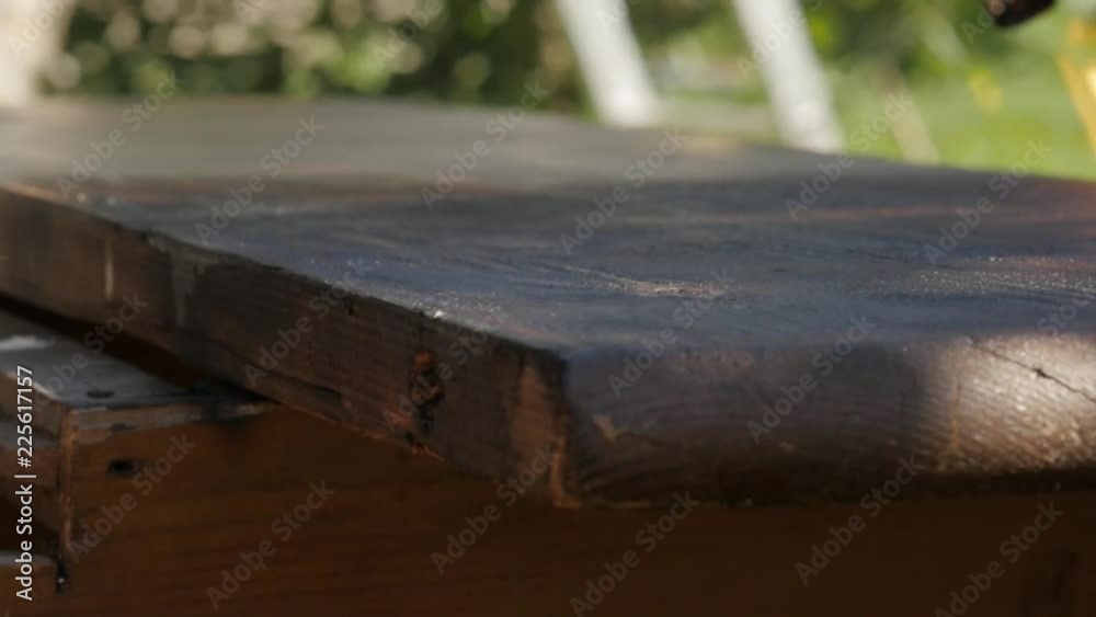 carpenter restoring old furniture. cleaning from old paint with fire. slow motion carpenter restoring old furniture. cleaning from old paint with fire. slow motion