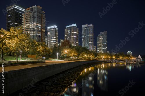 Coal Harbour seawall at night in downtown Vancouver, British Columbia.