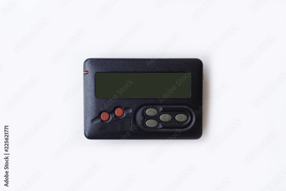 Old beeper or pager isolated on white background