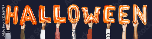 Hands holding the word Halloween illustration