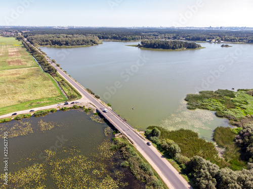 Wallpaper Mural aerial top view of rural landscape with big lake, green fields and forests Torontodigital.ca