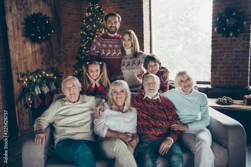 Portrait of cheerful glad family, noel gathering, meeting. Grey-