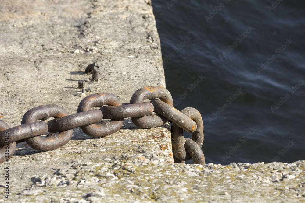 Old anchor chain on the dock