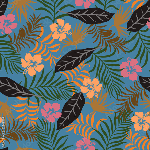 Tropical background with palm leaves and hibiscus flowers. Seamless floral pattern. Summer vector illustration. Flat jungle print