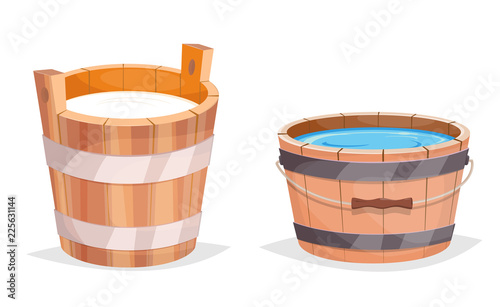 Wooden bucket with water and milk