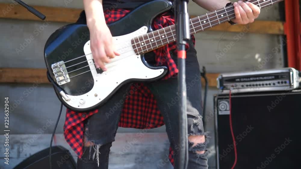 Guitar Rocker Guitars in live action at a concert. Concert rock band performing on ...