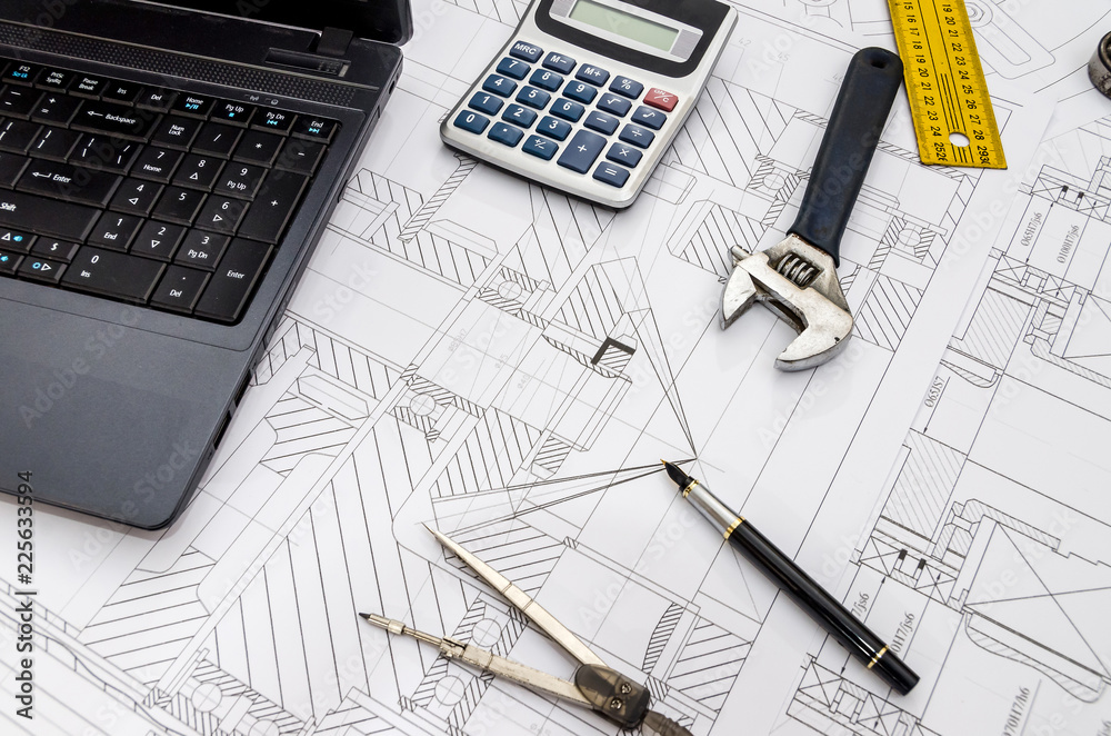 Engineer equipment on blueprint background, close up Engineer equipment on blueprint background, close up