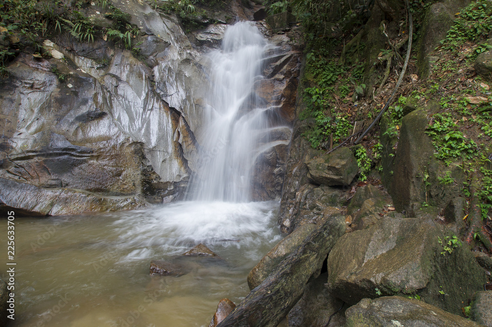 small waterfalls in tropical forest. small waterfalls in tropical forest.