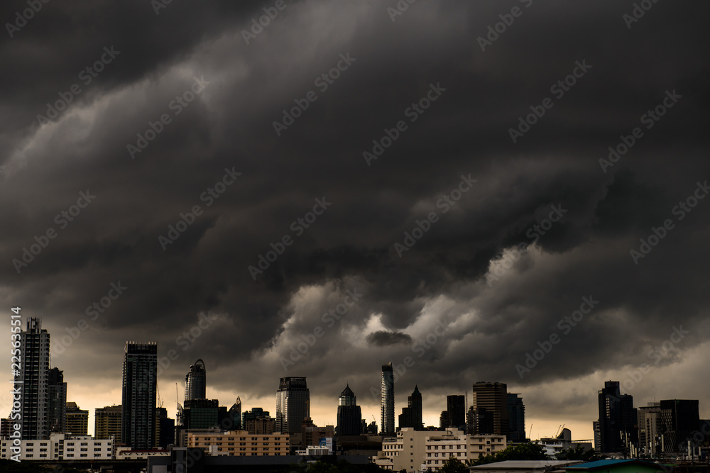 Abstract dark Storm Clouds background above bangkok city, THAILAND.
