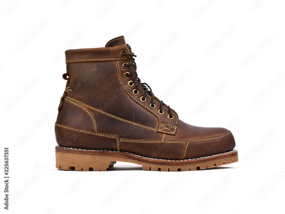 Men’s brown boot leather isolated on a white background.