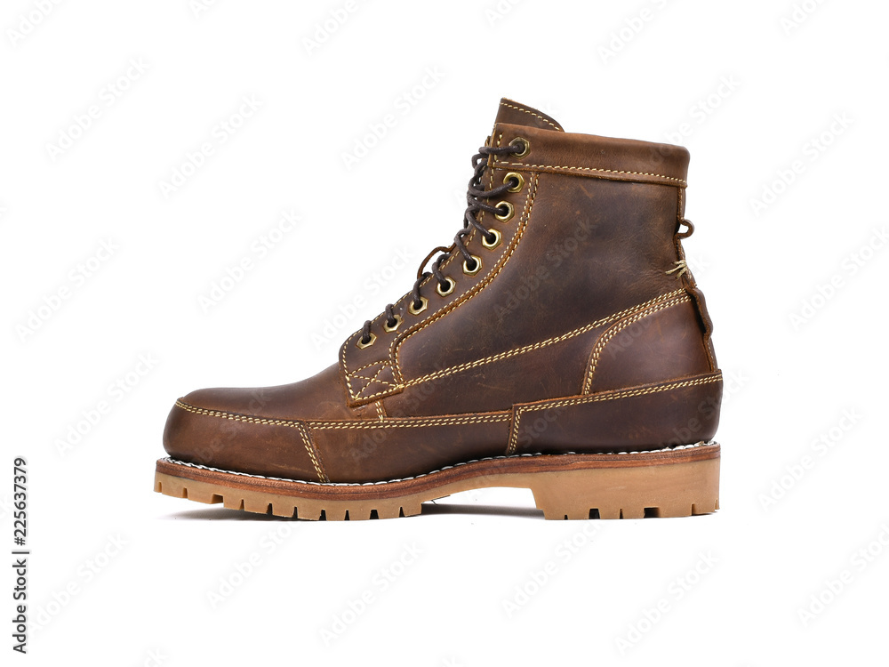 Men’s brown boot leather isolated on a white background. Men’s brown boot leather isolated on a white background.