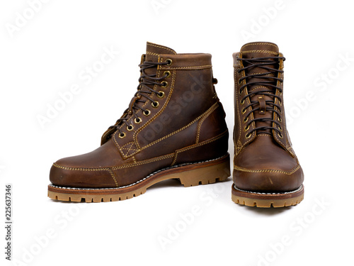 Men's brown boots isolated on a white background.