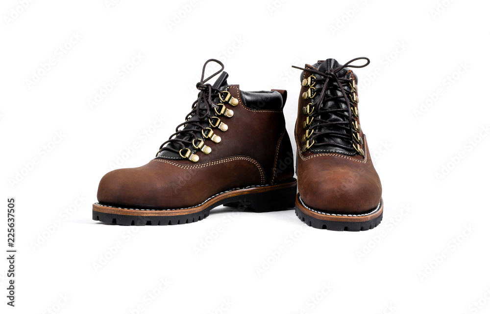 Men’s brown boot isolated on a white background.