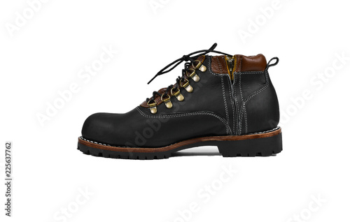 Men’s black boots isolated on a white background.