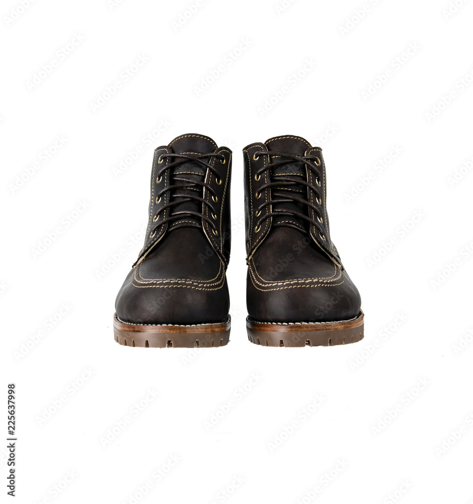 Men's brown boots isolated on a white background. 