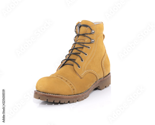 Men’s yellow boots isolated on white background.