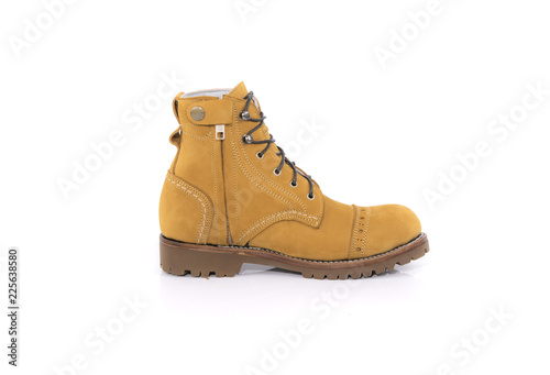 Men’s yellow boot with zipper isolated on white background, side view , closed up