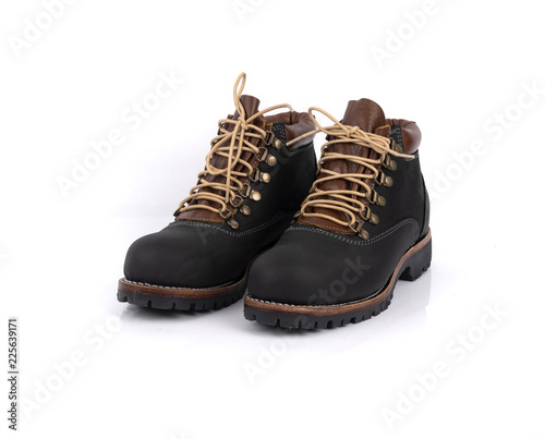 Men’s black boots isolated on white background.