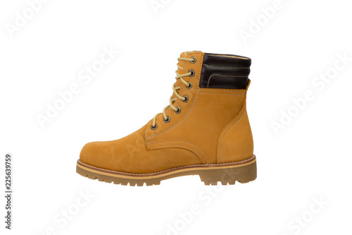 Yellow ankle boot isolated on a white background.
