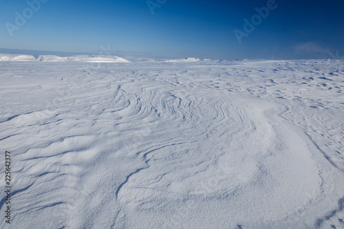 Snow plain on top of the mountain  Murmansk region  Russia