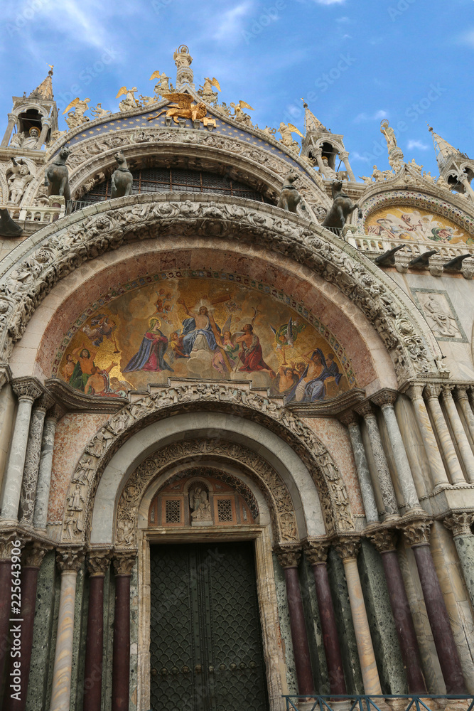 Big door of the Basilica of Saint Mark with fantastic mosaics in
