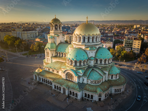 Alexander Nevsky cathedral in the golden light of the sunset - beautiful aerial shot of the famous landmark in Sofia, Bulgaria - a magnificent Orthodox church in the city center