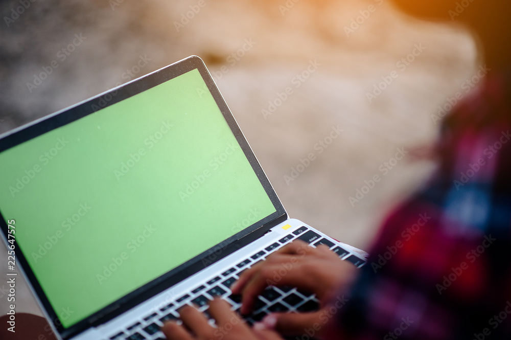 Hand and computer to work with computer. Online Business Through computer Technology Concepts Hand and computer to work with computer. Online Business Through computer Technology Concepts
