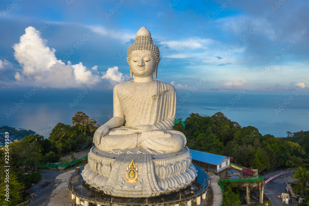 aerial photography scenery blue sky and blue ocean behind Phuket white big Buddha. Phuket white big Buddha is the .famous landmark in Phuket island a lot of tourists visiting this landmark every day aerial photography scenery blue sky and blue ocean behind Phuket white big Buddha. Phuket white big Buddha is the .famous landmark in Phuket island a lot of tourists visiting this landmark every day
