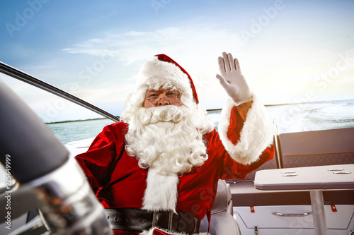 Santa Claus on boat and free space for your decoration. 