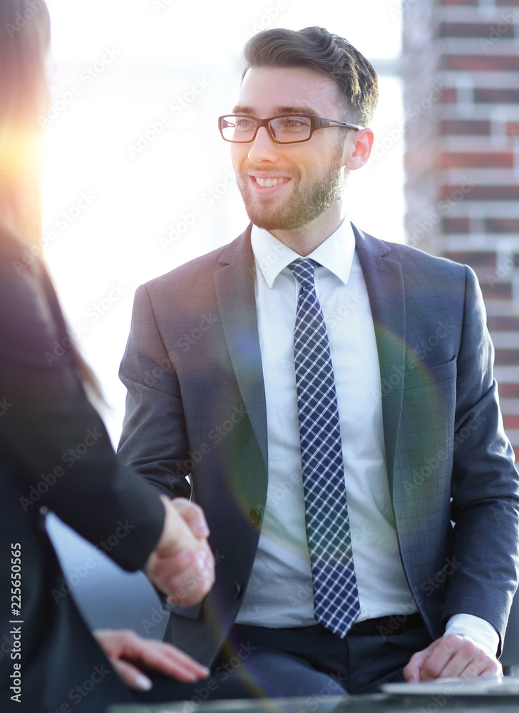 Successful businessmen handshaking after good deal. Successful businessmen handshaking after good deal.
