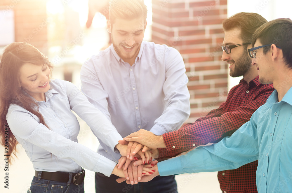 Obraz premium Group of people hands together partnership teamwork.
