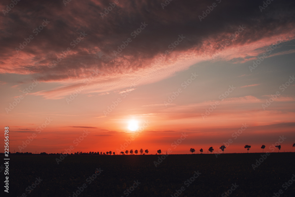 Landscape view of the countryside at colorful moody sunset light. Brunswick, Lower Saxony in Germany